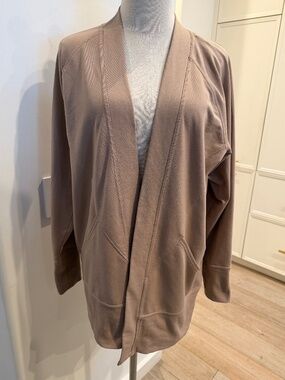 Tan liesure cardigan. Size M